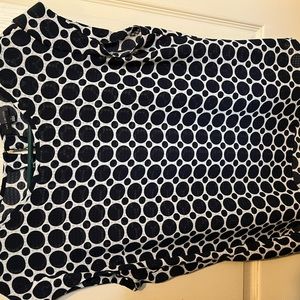 Great piece for the office! Eyelet close detail in back with minimal sleeve.